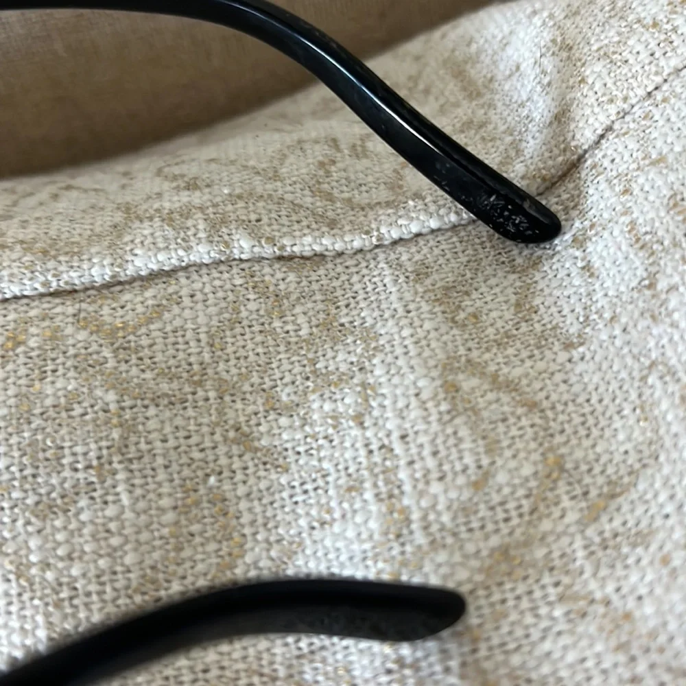 - Dolce and Gabbana black wire frame glasses